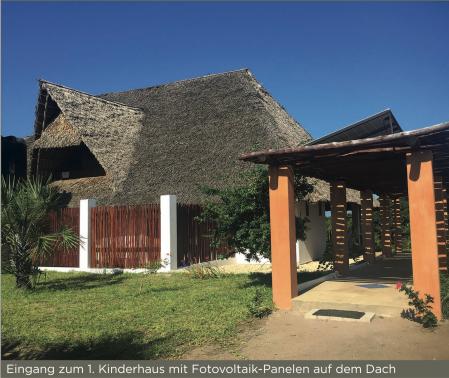 Entrance to the first orphanage with solar panels on the roof